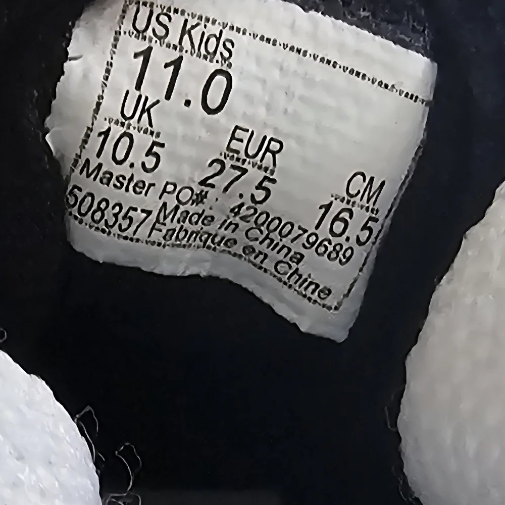 Kids Black and White Spot Low-Top Sneakers - Classic Style